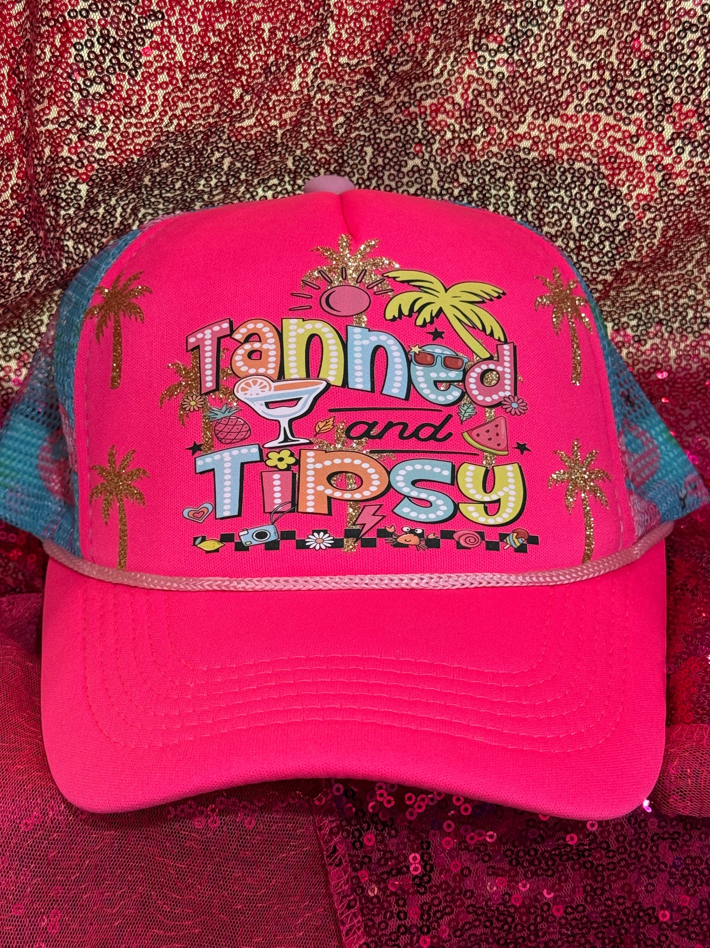Tanned and Tipsy on a flamingo hat