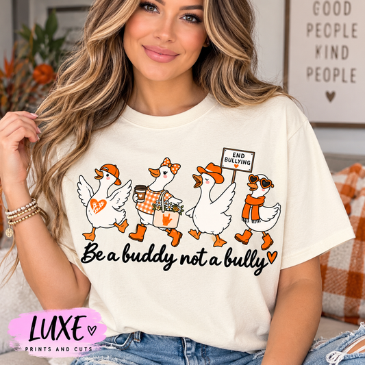 Woman modeling off-white Be a Buddy Not a Bully ducks shirt