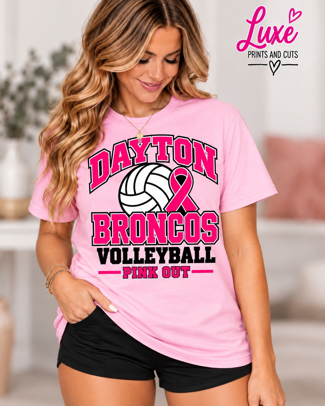 Light pink Dayton Broncos volleyball Pink Out T-shirt with awareness ribbon, woman's mockup and Luxe branding